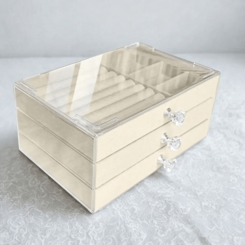 Boite a bijoux transparente blanche