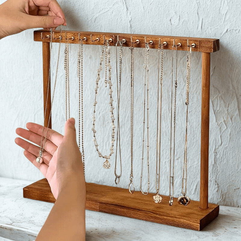 porte bijoux bois avec main