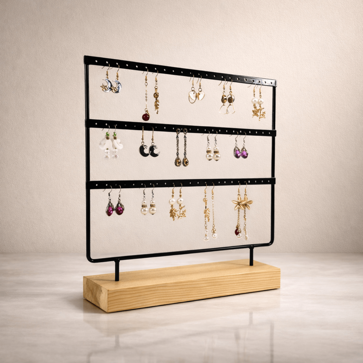 Support boucle d'oreille noir 